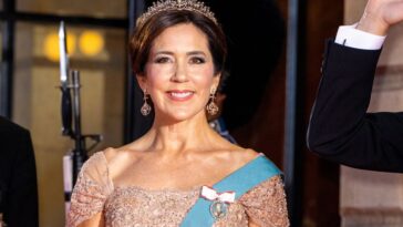 Mary from Denmark has the green swimsuit from recycled sea trash for summer 2023