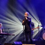 concert stage singer music lights