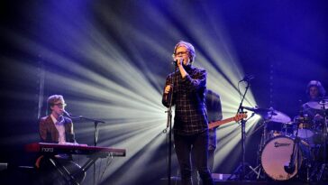 concert stage singer music lights