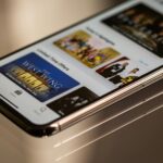 Close-up view of a smartphone featuring a streaming service interface, highlighting technology in modern entertainment.