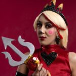 A vibrant cosplay portrait featuring artistic makeup and a trident, shot in Mexico City.