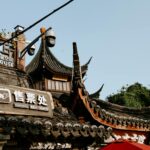 Capture of traditional Chinese rooftop with signage in Nanjing, China.