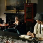A detective watches a conversation unfold in a vintage lounge, capturing the essence of noir fiction.