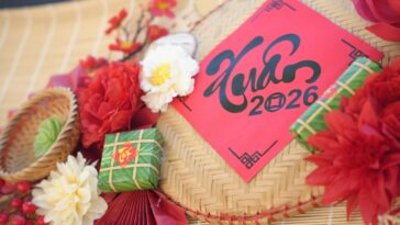 Vibrant Lunar New Year 2026 decoration featuring flowers and traditional elements for a festive ambiance.