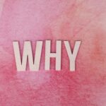 Bold white letters spelling WHY on a pink textured background for conceptual design.