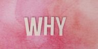 Bold white letters spelling WHY on a pink textured background for conceptual design.